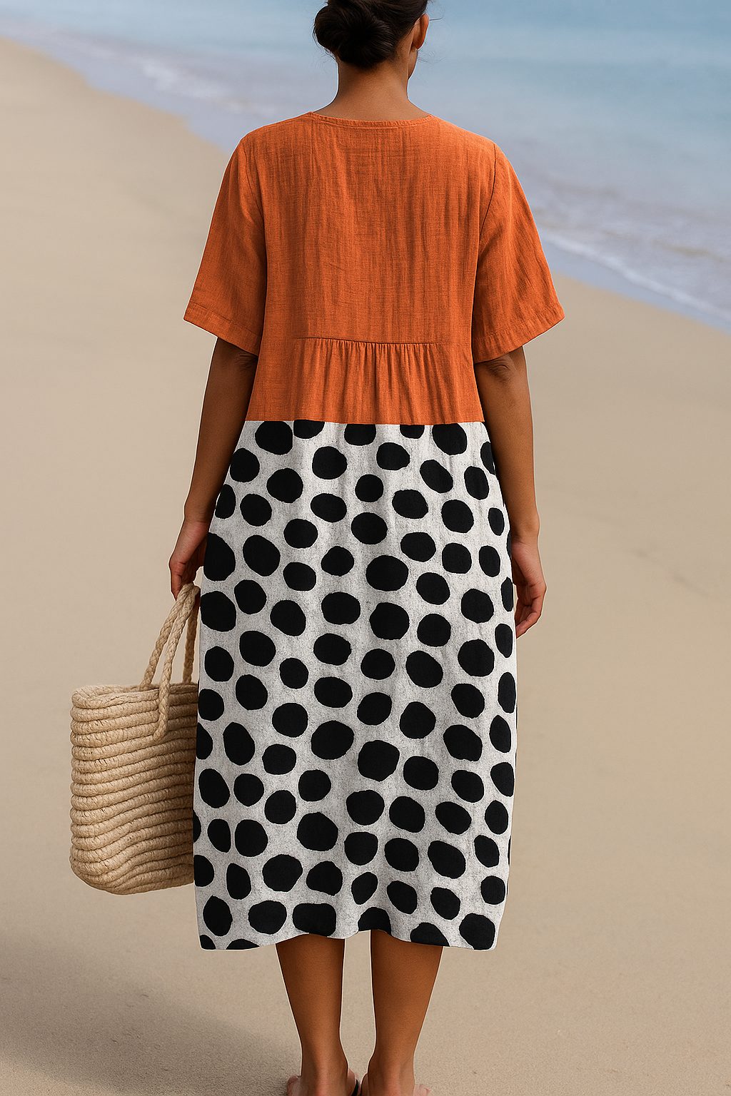 Maëlle | Abito arancione con pois a contrasto