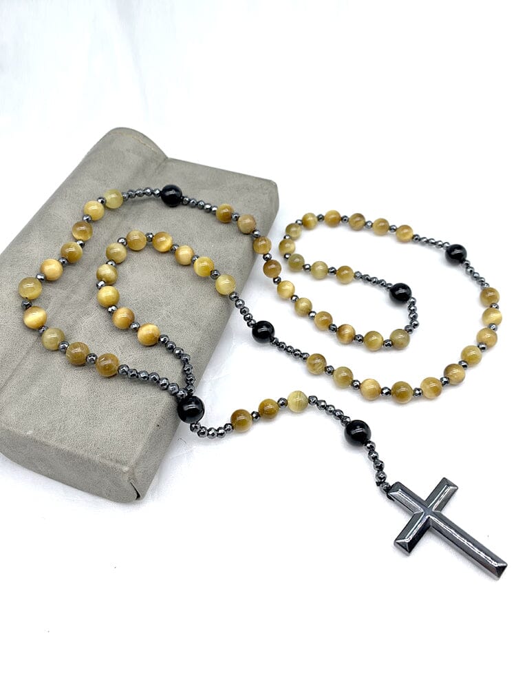 Collana con pendente a croce in pietra naturale