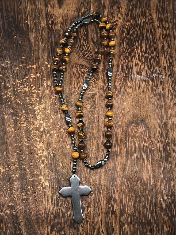 Collana con pendente a croce in pietra naturale